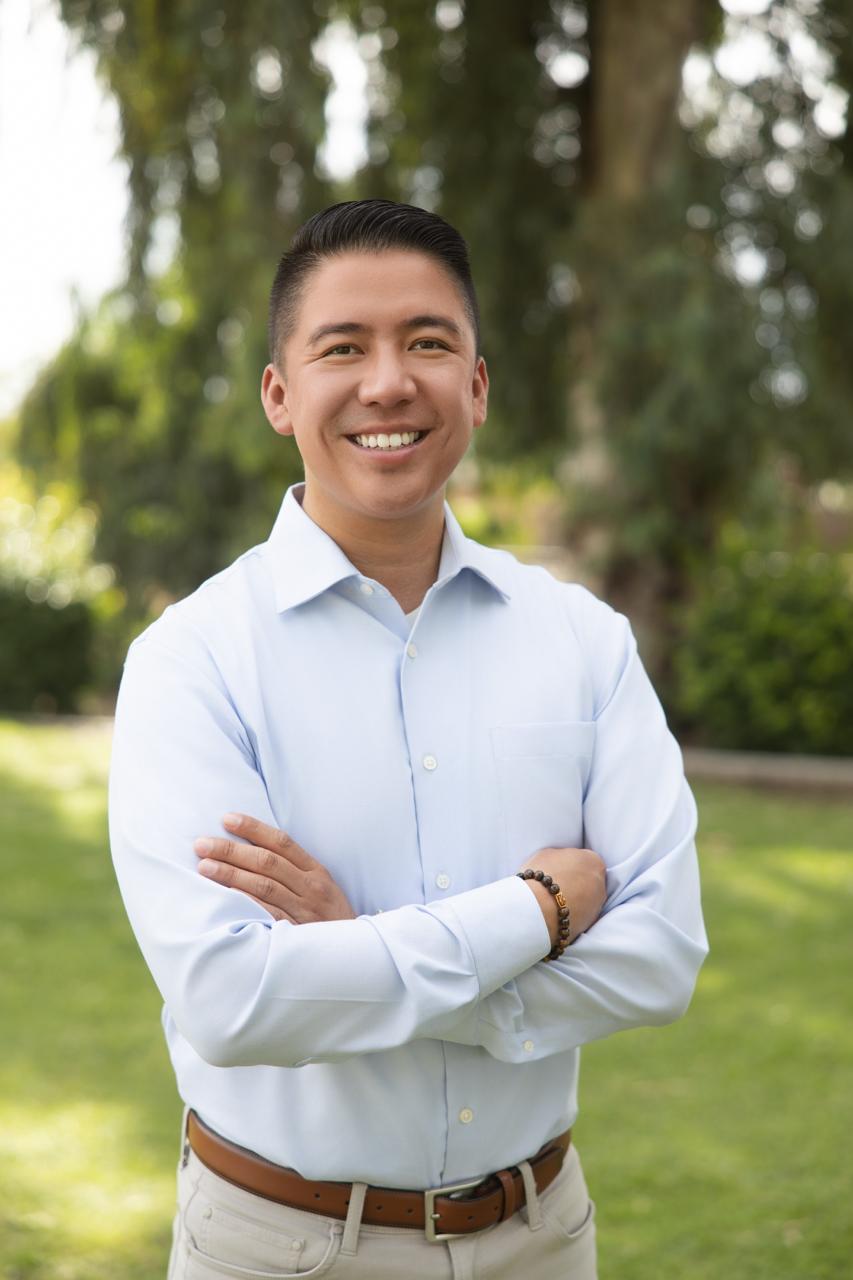 Eric Arias smiling outdoors